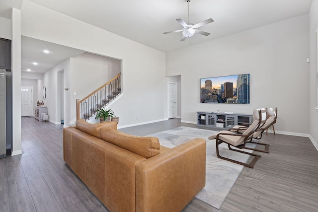 571 Sue Peaks Loop, Dripping Springs, TX 78620 - living room featuring a ceiling fan, baseboards, recessed lighting, wood finished floors, and stairway
