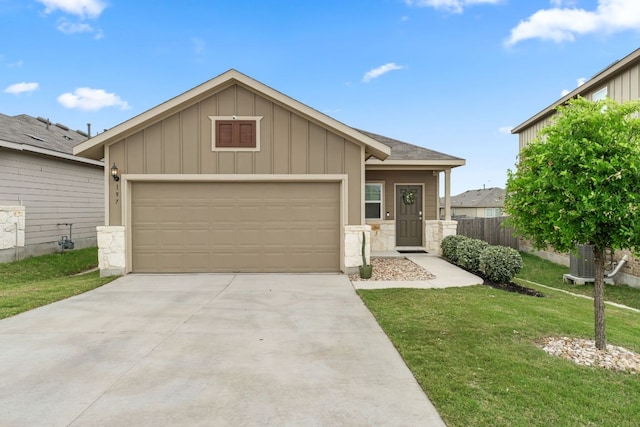 ranch-style home with board and batten siding, concrete driveway, a front lawn, and a garage