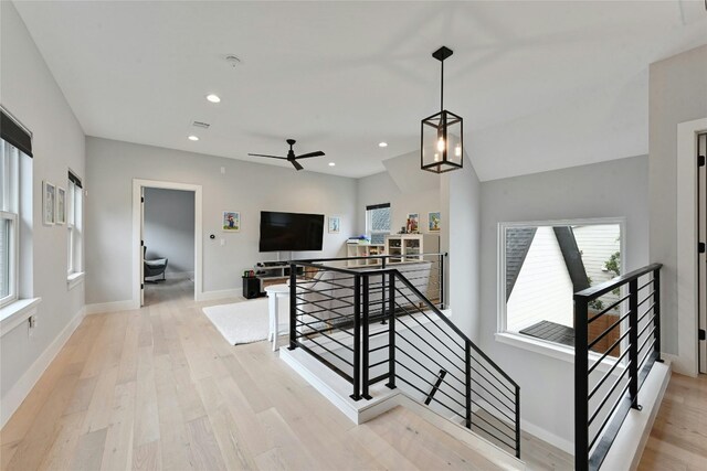 7103 Daugherty St, Austin, TX 78757 - stairs with wood finished floors, recessed lighting, and a ceiling fan
