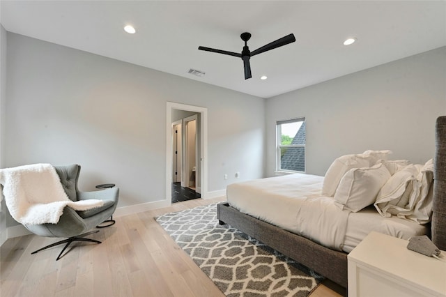 bedroom with visible vents, baseboards, recessed lighting, light wood-type flooring, and a ceiling fan