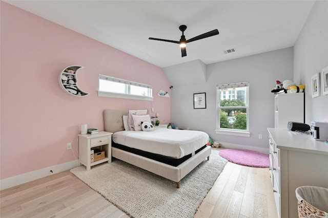 7103 Daugherty St, Austin, TX 78757 - bedroom featuring light wood-type flooring and a ceiling fan
