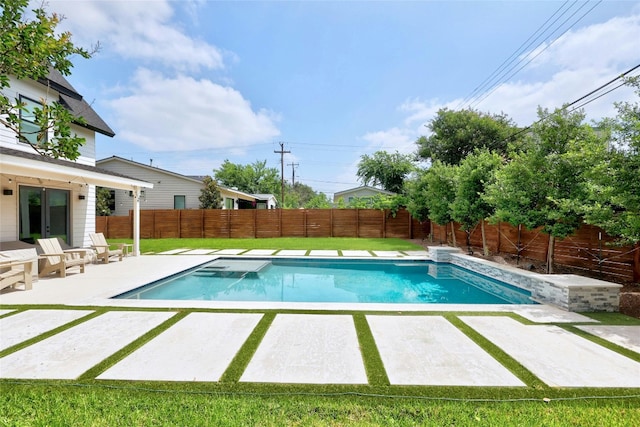 view of pool with a patio, a fenced in pool, and a fenced backyard