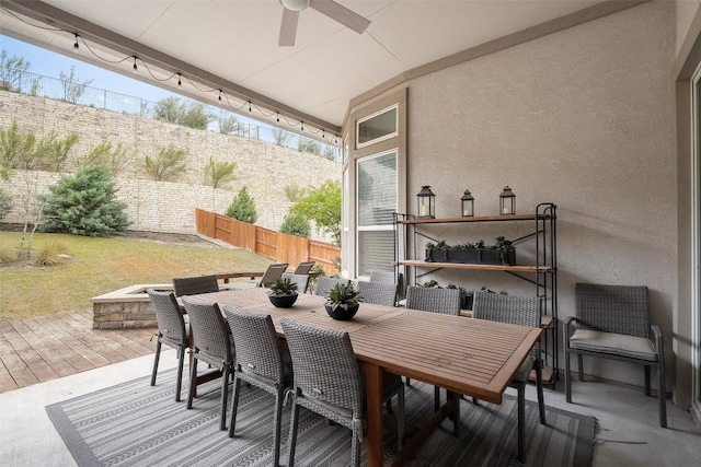 5812 Antelope Well Ln, Austin, TX 78738 - view of patio featuring ceiling fan, outdoor dining space, and a wooden deck