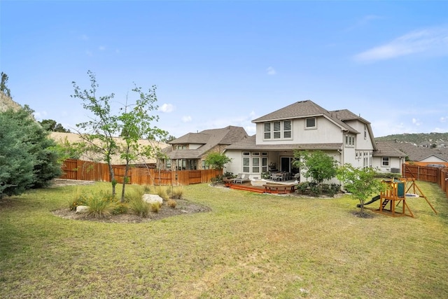 5812 Antelope Well Ln, Austin, TX 78738 - back of house with a patio area and stucco siding