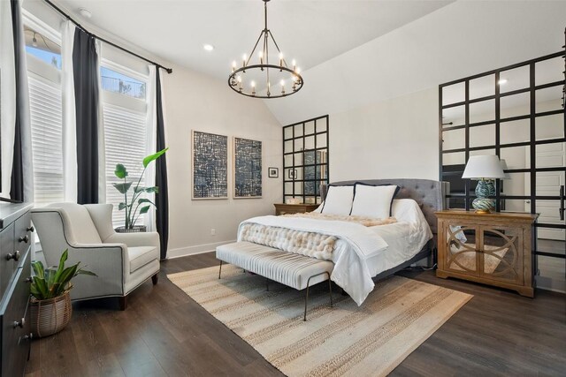 bedroom featuring a notable chandelier, recessed lighting, baseboards, wood finished floors, and lofted ceiling