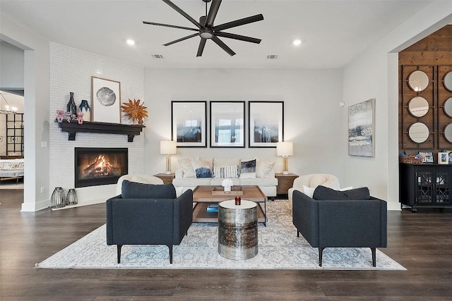5812 Antelope Well Ln, Austin, TX 78738 - living room with a ceiling fan, a brick fireplace, wood finished floors, and recessed lighting
