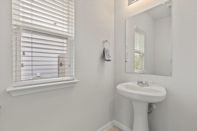 bathroom with baseboards