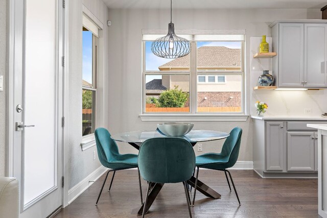 800 Kenney Fort Xing, Round Rock, TX 78665 - dining area with dark wood-type flooring and baseboards