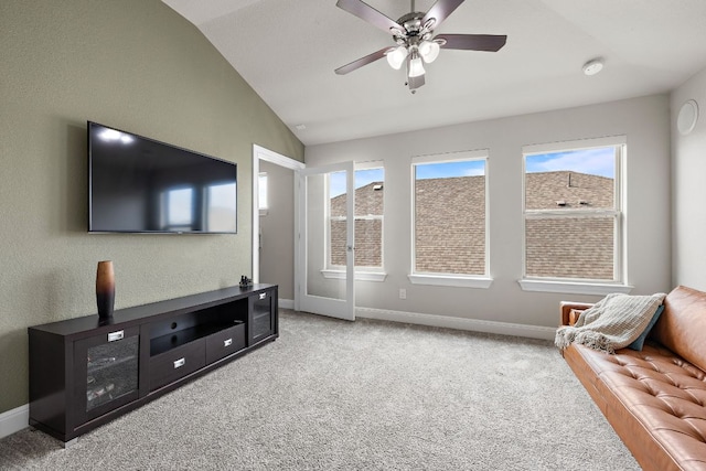 800 Kenney Fort Xing, Round Rock, TX 78665 - carpeted living area featuring vaulted ceiling, baseboards, and ceiling fan