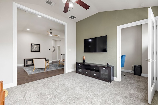 800 Kenney Fort Xing, Round Rock, TX 78665 - living area with a ceiling fan, vaulted ceiling, carpet floors, and baseboards