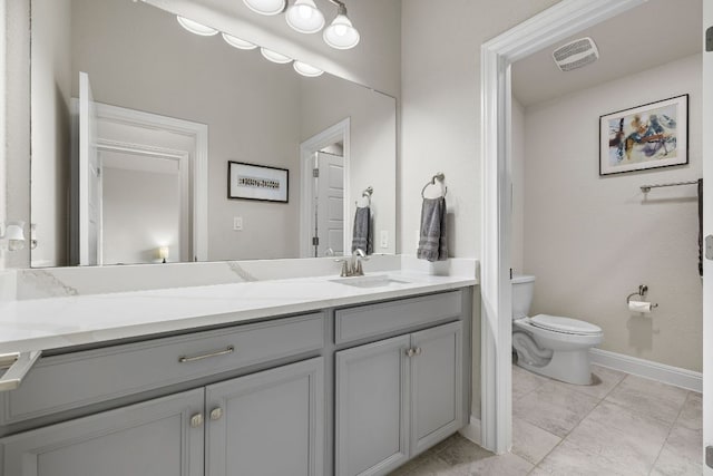 800 Kenney Fort Xing, Round Rock, TX 78665 - bathroom featuring toilet, vanity, baseboards, and tile patterned flooring