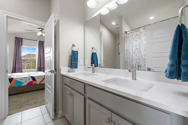 800 Kenney Fort Xing, Round Rock, TX 78665 - ensuite bathroom with tile patterned flooring, double vanity, a ceiling fan, and curtained shower