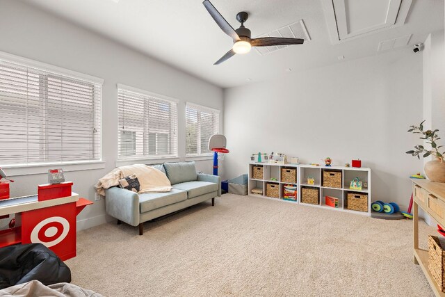 1403 Matthews Ln, Austin, TX 78745 - game room with carpet floors, attic access, and ceiling fan