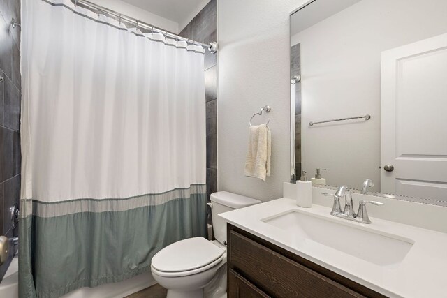 1403 Matthews Ln, Austin, TX 78745 - bathroom featuring vanity and shower / tub combo with curtain