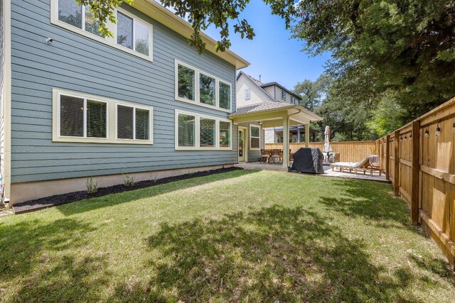 1403 Matthews Ln, Austin, TX 78745 - back of house with a patio area