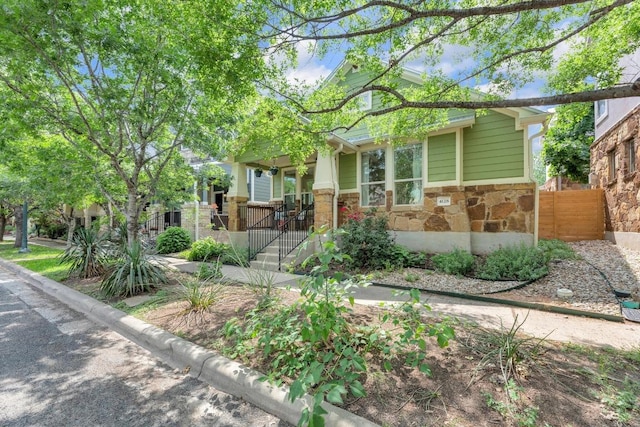 4128 E Lawless St, Austin, TX 78723 - view of front of home with stone siding and covered porch