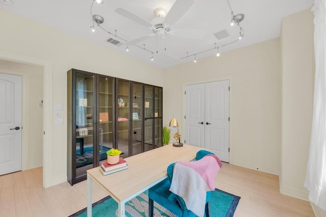 4128 E Lawless St, Austin, TX 78723 - office area featuring ceiling fan, light wood-style floors, and track lighting