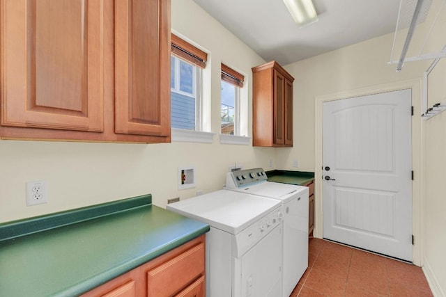 4128 E Lawless St, Austin, TX 78723 - laundry area featuring cabinet space, light tile patterned floors, and washing machine and dryer