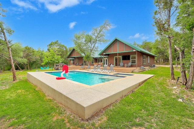 9854 N Weir Loop Cir, Austin, TX 78736 - outdoor pool with a wooden deck, a yard, and a patio area