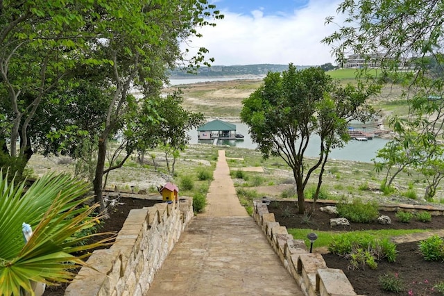 view of home's community featuring a water view