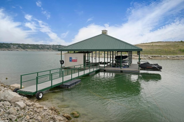 dock area featuring a water view and boat lift