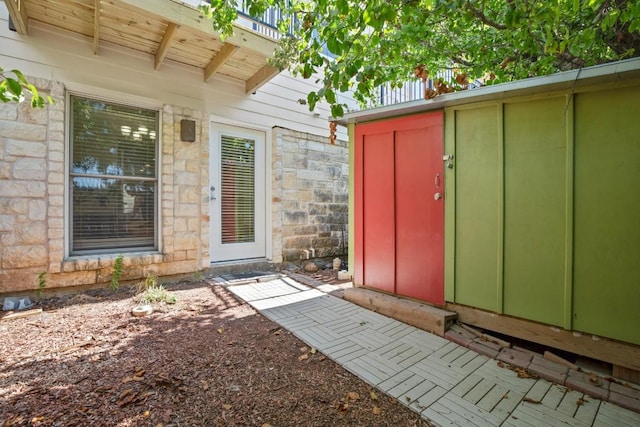 6900 E Riverside Dr Unit 17, Austin, TX 78741 - property entrance with stone siding