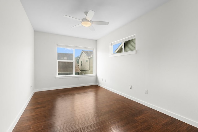 301 W Stassney Ln Unit 3, Austin, TX 78745 - empty room featuring healthy amount of natural light, wood finished floors, and ceiling fan