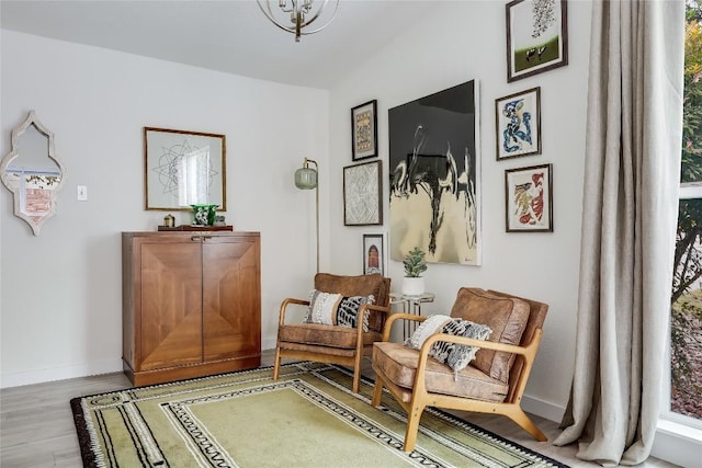 1415 Mearns Meadow Blvd, Austin, TX 78758 - sitting room with baseboards and wood finished floors