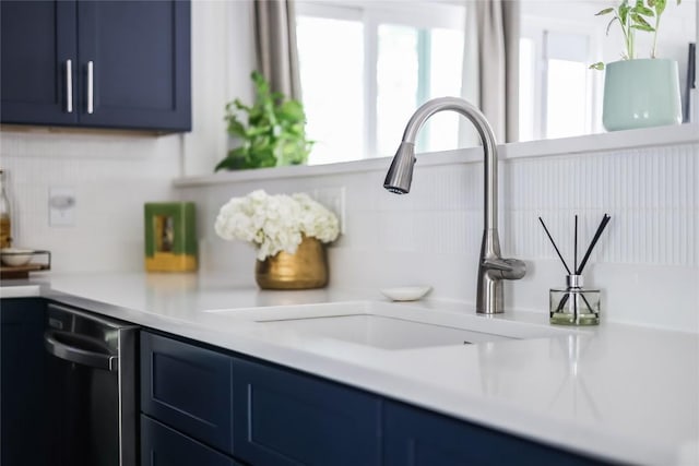 1415 Mearns Meadow Blvd, Austin, TX 78758 - detailed view of a sink and dishwashing machine