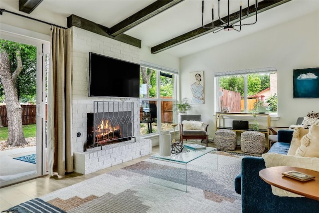 1415 Mearns Meadow Blvd, Austin, TX 78758 - living room featuring a brick fireplace, beamed ceiling, and wood finished floors