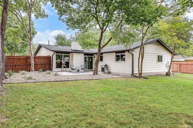 1415 Mearns Meadow Blvd, Austin, TX 78758 - back of house with a patio area and brick siding