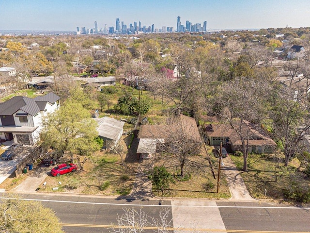 birds eye view of property featuring a view of city