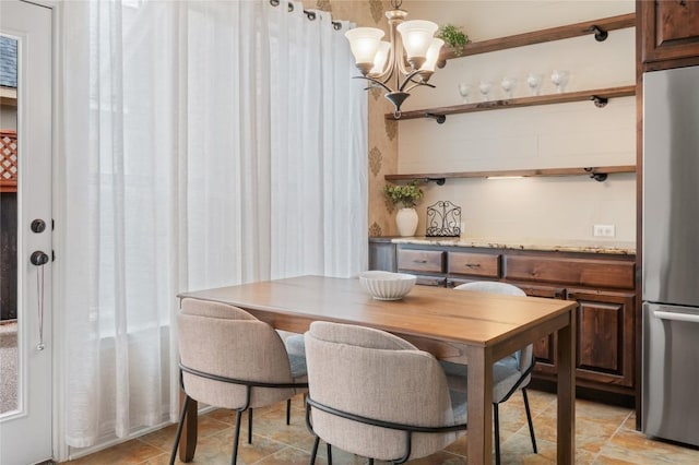 2420 Champions Corner Dr, Leander, TX 78641 - dining room featuring a chandelier