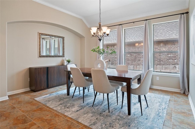2420 Champions Corner Dr, Leander, TX 78641 - dining area with ornamental molding, a chandelier, baseboards, and arched walkways