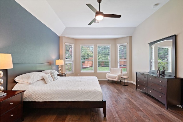 2420 Champions Corner Dr, Leander, TX 78641 - bedroom with dark wood finished floors, ceiling fan, and vaulted ceiling
