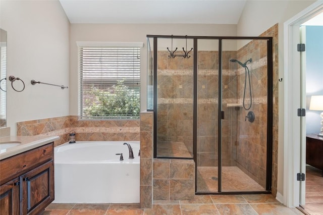 2420 Champions Corner Dr, Leander, TX 78641 - full bath with a garden tub, vanity, and a shower stall