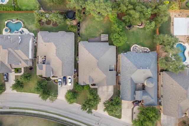 2420 Champions Corner Dr, Leander, TX 78641 - aerial overview of property's location featuring a pool area and nearby suburban area