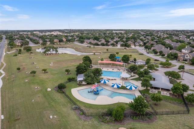 2420 Champions Corner Dr, Leander, TX 78641 - aerial view of residential area with a pool area and a large body of water
