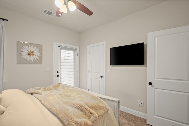 581 Demarett Dr, Point Venture, TX 78645 - bedroom with light carpet, baseboards, and ceiling fan