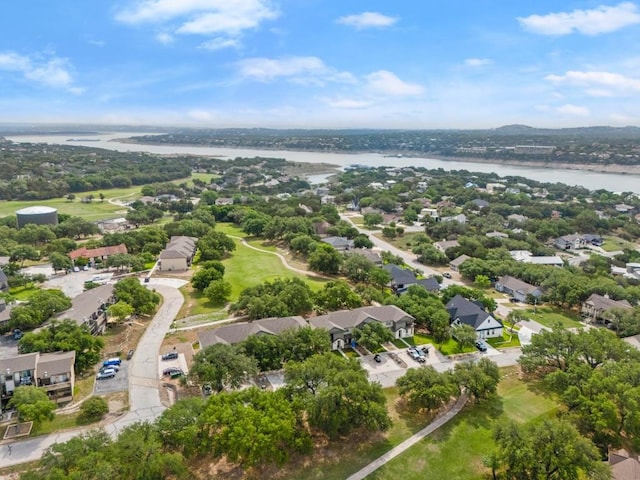 birds eye view of property featuring a water view and a residential view