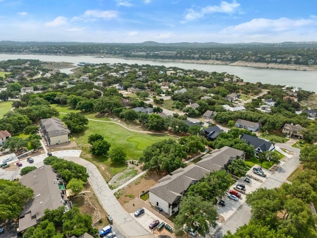 aerial view with a residential view and a water view