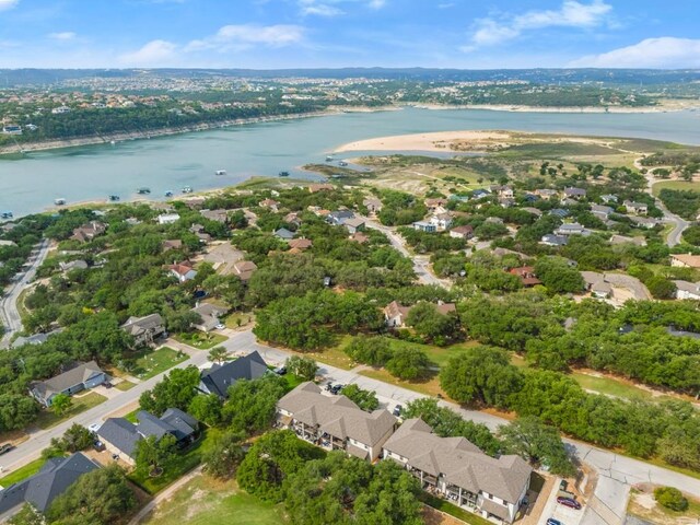 aerial view featuring a residential view and a water view