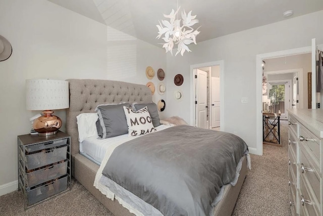 581 Demarett Dr, Point Venture, TX 78645 - bedroom with carpet, baseboards, and a chandelier
