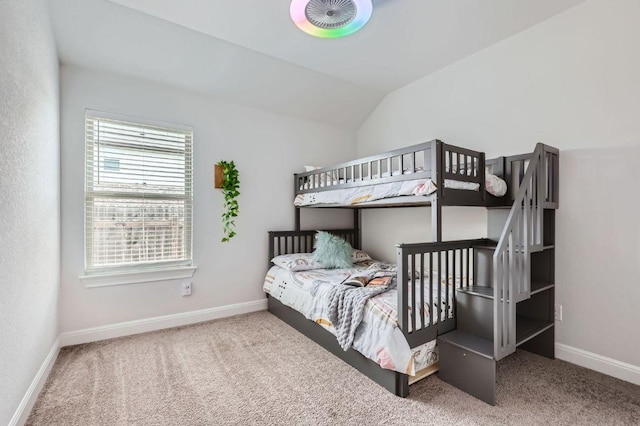 304 La Joya Pass, Leander, TX 78641 - carpeted bedroom with lofted ceiling and baseboards