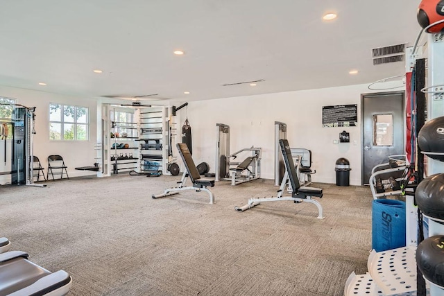 exercise room featuring recessed lighting, visible vents, and carpet