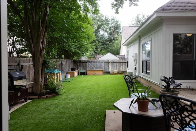 view of yard featuring fence
