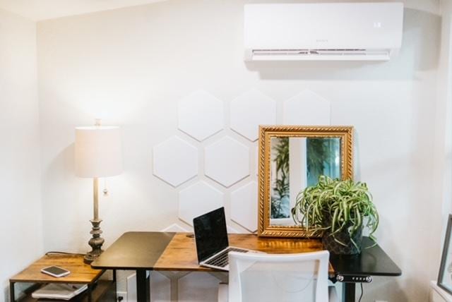 office featuring a wall mounted AC