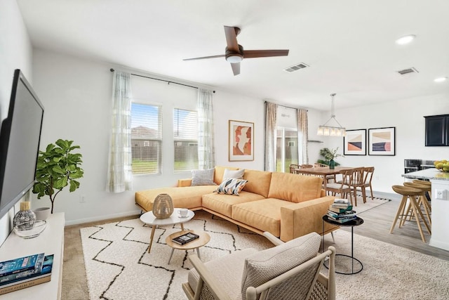 516 Peony Ct, Jarrell, TX 76537 - living area featuring a ceiling fan, recessed lighting, baseboards, and light wood-style flooring