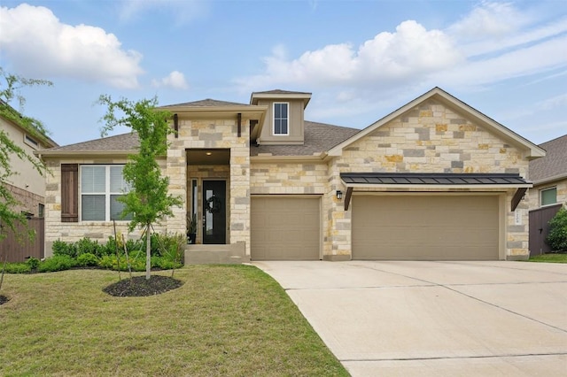 view of front of home featuring concrete driveway, a garage, stone siding, and a front lawn
