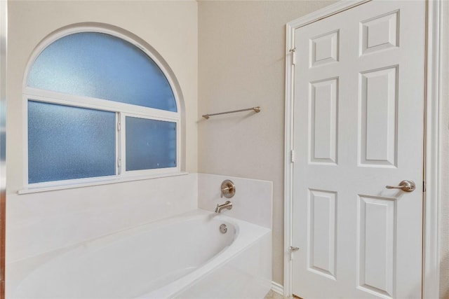 full bath featuring a garden tub